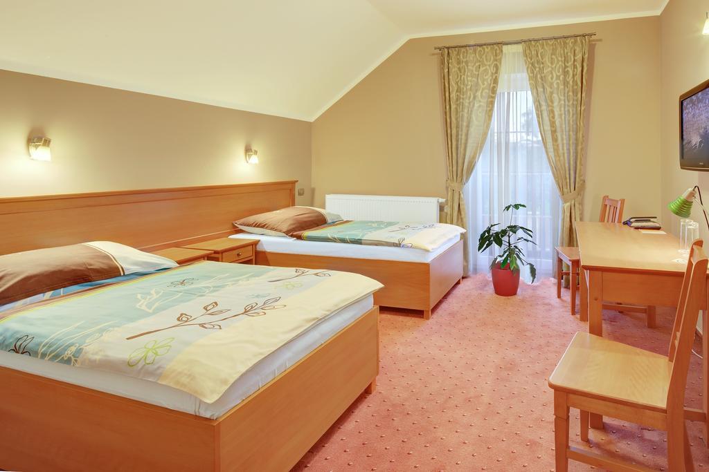 Penzion Harmonie Žlutice Habitación foto