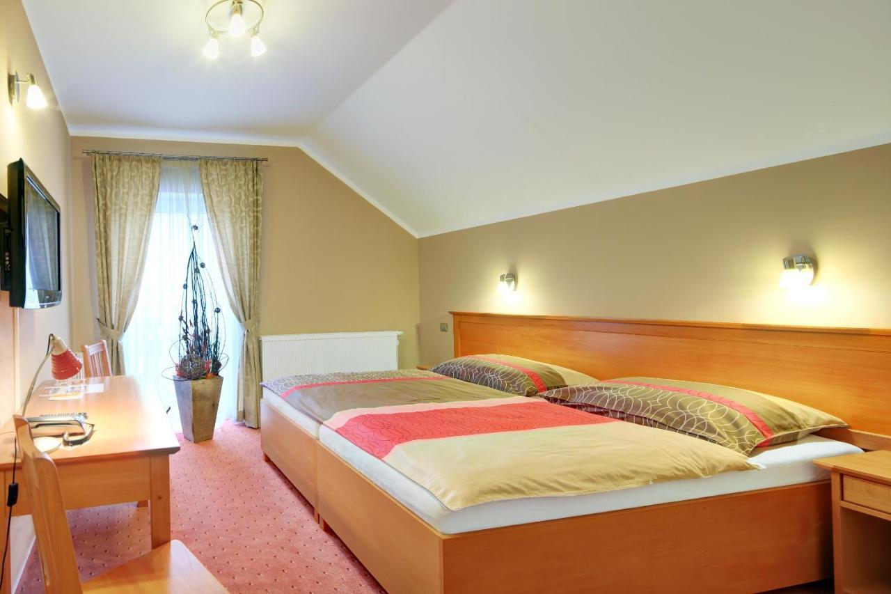 Penzion Harmonie Žlutice Habitación foto